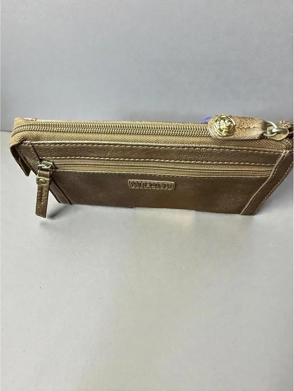 Relic Bronze Metallic Leather Wristlet with Floral Applique